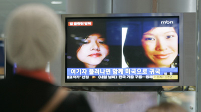 Television reports in South Korea. (AP)