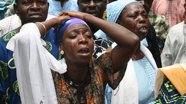 Mourners at Bayo Ohu's funeral. (The Vanguard)