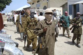 Al-Shabaab militants patrol Bakara market. (Reuters)