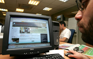 The Web may be more restricted if Jordan applies press law provisions to online publications. (AP/Mohammad abu Ghosh)