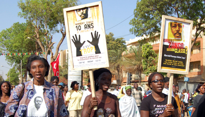 Zongo's death resonates a decade later as protesters gather for a 2008 rally in Ouagadougou. (AFP)