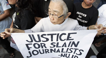 Protesters in Manila seek justice in the Maguindanao massacre. (Reuters/Romeo Ranoco)