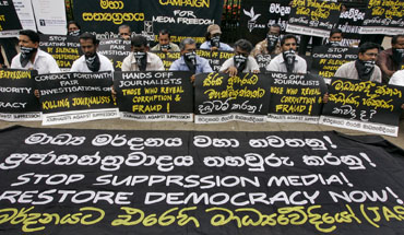 At a March rally in Colombo, protesters seek restoration of free expression. (AP/Chamila Karunarathne)