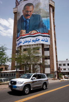 Billboard-sized images of the president are common throughout the country. (Reuters/Khaled Abdulla)