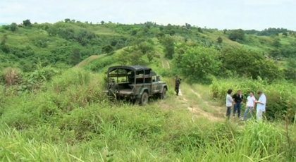 Members of CPJ's delegation to the Philippines can be seen here in a video still on the killing grounds where 57 people lost their lives in the Maguindano massacre.