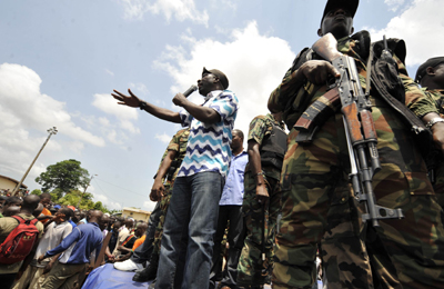 Gbagbo youth leader Charles Blé Goudé urges supporters to take up arms. (AFP/Sia Kambou)