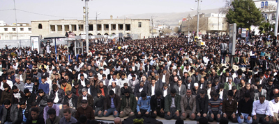 Kurdish demonstrators pray in Sulaimaniya following protests. (AFP/Shwan Mohammed)