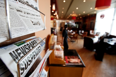 Newspaper headlines report that Bahrain has suspended opposition newspaper Al-Wasat. (Reuters)