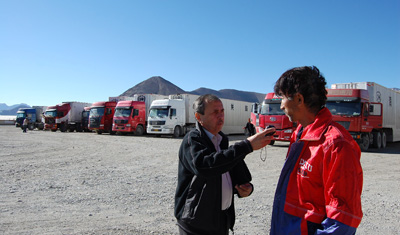 Urinboy Umanov, left, at work in Tajikistan.(BBC World Service)