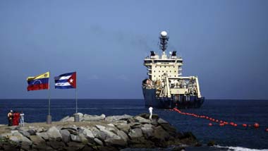 In January, a ship lays fiber-optic cable linking Venezuela and Cuba, a project ushering high-speed Internet to the island. (AP/Ariana Cubillos)