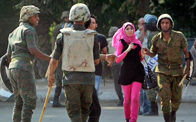 Egyptian army soldiers keep demonstrators away from the Israeli embassy in Cairo. (Reuters)