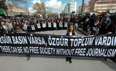 Hundreds of Turkish journalists march to protest detentions and demand reforms to media laws in Ankara on March 19, 2011. (AP Photo/Burhan Ozbilici)