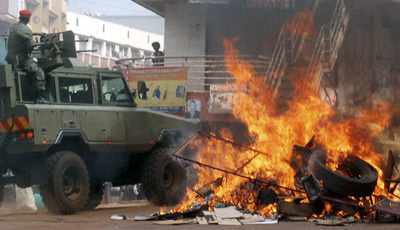 Civil unrest grips downtown Kampala. Ugandan President Yoweri Museveni said journalists who covered the protests were 'enemies' of the country's development. (AP/Stephen Wandera)