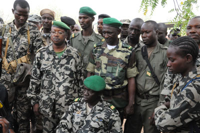 Mali junta leader Captain Amadou Sanogo, center, poses surrounded by fellow soldiers in Bamako Thursday. (AFP/Habibou Kouyate)