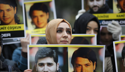 Demonstrators in Istanbul protest the disappearance of two Turkish journalists in Syria. (Reuters/Osman Orsal)