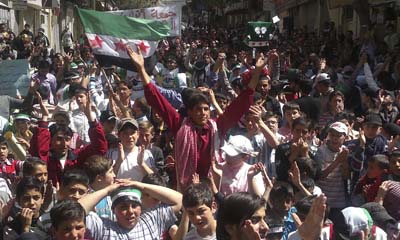 The Syrian regime has tried to crack down on journalists filming protests like this one in Damascus on Friday. (Reuters/Shaam News Network)