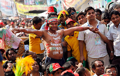 Bangladeshi opposition supporters demonstrate in Dhaka on March 12 against an amendment introduced by the ruling party which scraps caretaker governments during elections. (AP/Aijaz Rahi)