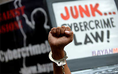 Protesters rallied against the cybercrime law in front of the Supreme Court building in Manila on Tuesday. (AFP/Noel Celis)