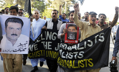 Pakistani journalists protest the murder of Abdul Haq Baloch, a TV reporter killed in Baluchistan. (AFP/Banaras Khan)