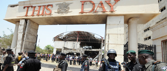 The Islamist militant sect Boko Haram claimed responsibility for this bombing of the offices of ThisDay newspaper in Abuja. (AFP/Pius Utomi Ekpei)