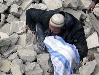 As Syria becomes riskier for both staff and freelance journalists, news organizations are more reliant on images from citizen journalists. An example is this image showing devastation in Aleppo, which was taken by the Aleppo Media Center and transmitted by The Associated Press on Sunday. (AP/Aleppo Media Center)