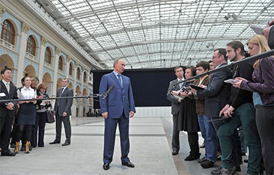 Vladimir Putin speaks to the media following a live nationwide broadcast phone-in, in Moscow Thursday. (Reuters/Mikhail Klimentyev/RIA Novosti)