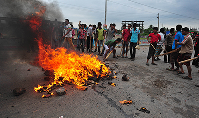 Hifazat-e-Islam protesters set fire to wood and tires during demonstrations earlier this week. (Reuters)