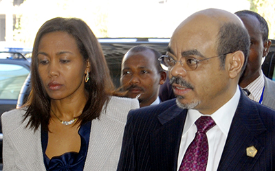 A journalist is being harassed in connection with a seven-month-old story about Azeb Mesfin, seen here with her husband, the late leader Meles Zenawi. (AP/Samson Haileyesus)