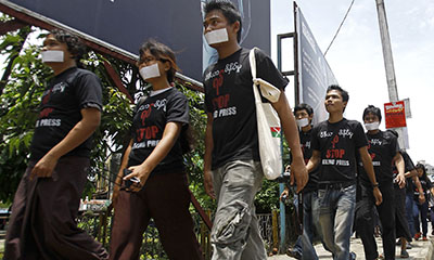 Burmese journalists stage a protest called "Stop Killing Press" in Rangoon. (AFP/Ye Aunt Thu)