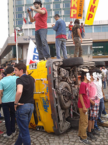 Protesters have attacked news vans, accusing outlets of covering the demonstrations from the government's perspective. (CPJ)