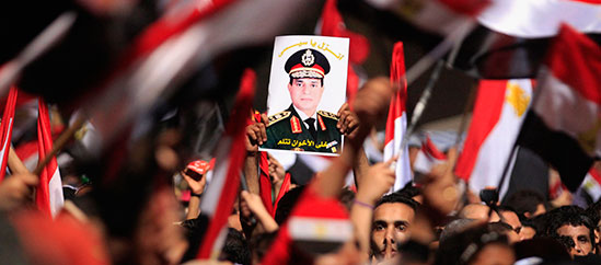 At a Tahrir Square rally, an image of al-Sisi. (Reuters/Mohamed Abd El Ghany)