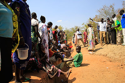 Families displaced by fighting wait to be registered for food rations at a makeshift camp inside a United Nations facility on the outskirts of Juba on Monday. (Reuters/James Akena)