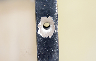 A bullet hole in the home of Nigerian journalist Bayo Ohu, who was shot dead in September 2009. (AFP/Pius Utomi Ekpei)