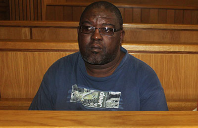 Bheki Makhubu, editor of The Nation, is seen in court in March. Makhubu was convicted today on contempt of court charges. (AFP/Debra Khumalo)