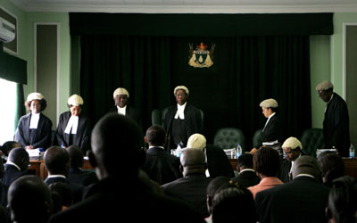Zimbabwe's Constitutional Court's decision to strike down criminal defamation must be implemented. (AFP/Jekesai Njikizana)