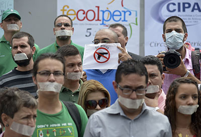 Journalists protest the murder of Colombian reporter Luis Carlos Cervantes. (AFP/Raul Arboleda)