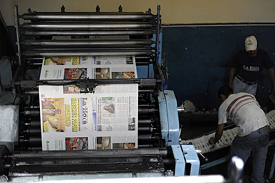 A printing press in Guatemala. Journalists there say covering sensitive issues is risky. (AFP/Johan Ordonez)