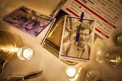 Petitions calling for the release of Nguyen Van Hai are scattered across a table at the CPJ International Press Freedom Awards. Hai is serving a 12-year sentence for blogging. (Michael Nagle/Getty Images for Committee to Protect Journalists/AFP)