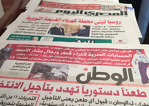 Egyptian papers, pictured February 11, report on upcoming elections. The space for independent reporting in the country is being squeezed. (CPJ Staff)