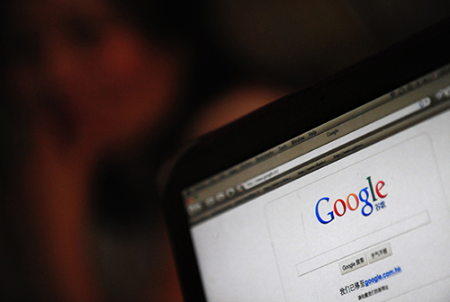 Google's landing page for China is viewed on a laptop in Hong Kong. False credentials were issued for Google and other domains by Chinese digital certificate company CNNIC. (AFP/Frederic J. Brown)