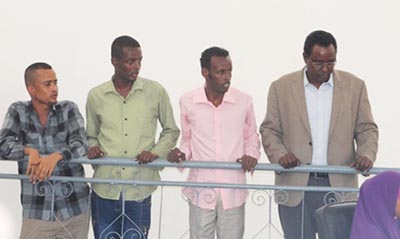 The four radio journalists, seen in court in Mogadishu. From left: Mohamud Mohamed Dahir, Mohamed Bashir Hashi, Ahmed Abdi Hassan, and Abdimalik Yusuf Mohamed. (Radio Kulmiye)