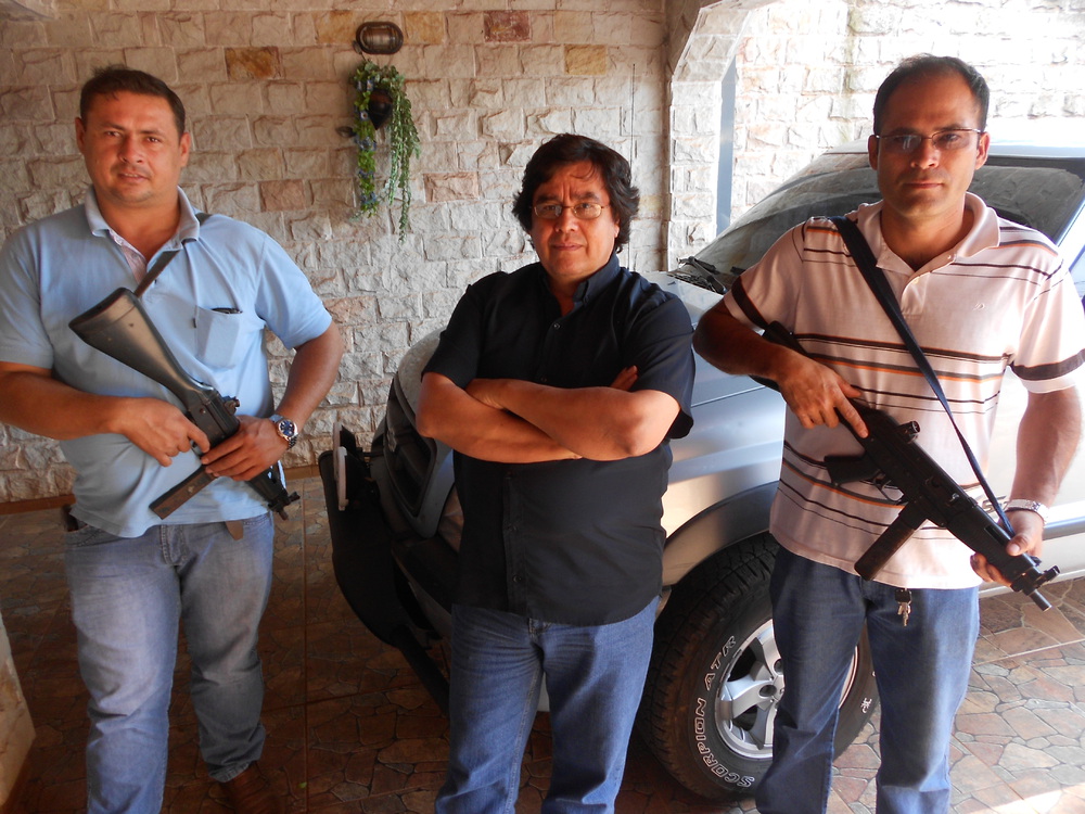 Cándido Figueredo, veteran border-beat reporter for Paraguay's largest newspaper, travels with armed bodyguards on the rare occasions that he leaves the safety of his home. (John Otis)