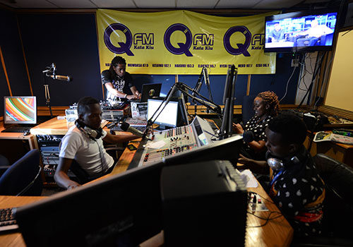 Q radio presenters during a broadcast in March 2015. The station is owned by Nation Media Group, one of the ‘big five’ privately owned Kenyan news outlets. (AFP/Simon Maina)
