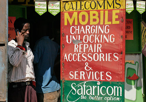 A cell phone shop in the Kibera slum in Nairobi. Despite the country’s advances in technology Kenyans do not have greater access to objective news. (AP/Khalil Senosi)
