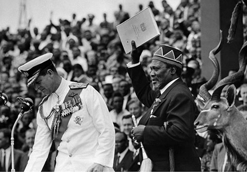 Jomo Kenyatta celebrates Kenya’s newly found independence with Prince Philip at a ceremony in December 1963. Land grants issued by Kenyatta after independence continue to be a sensitive issue. (AFP)