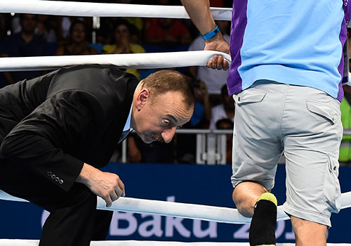 Azerbaijani President Ilham Aliyev enters a boxing ring at the first European Games in Baku in 2015. Despite Azerbaijan jailing journalists and human rights activists, the EU is pursuing a close relationship with the country. (AFP/Tobias Schwarz)