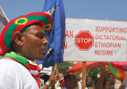 Ethiopian migrants living in Malta protest outside the prime minister’s office, calling on the European Union to stop supporting the Ethiopian government. (Reuters/Darrin Zammit Lupi)