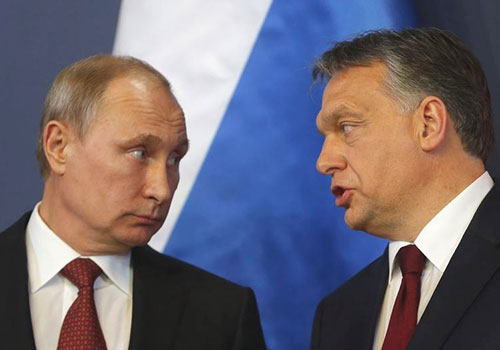 Russian President Vladimir Putin, left, and Hungarian Prime Minister Viktor Orbán, who has passed a series of press laws that go against EU values.  (Reuters/Laszlo Balogh)