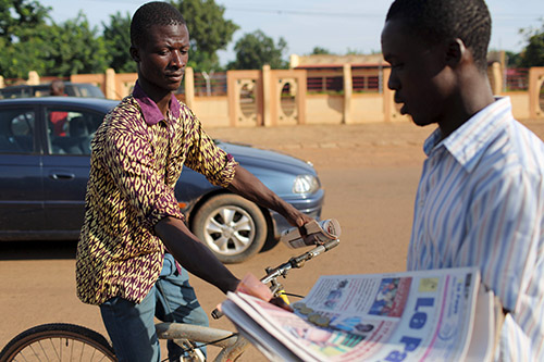 Newspapers are sold on the streets of Ouagadougou in September. News outlets silenced during the failed coup are reporting again, local journalists say. (Reuters/Joe Penney)