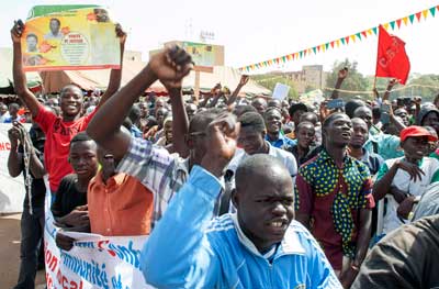 Thousands of people demonstrate on December 13, 2014, in Ouagadougou to pay homage to murdered journalist Norbert Zongo. (AFP/Ouoba Ahmed)